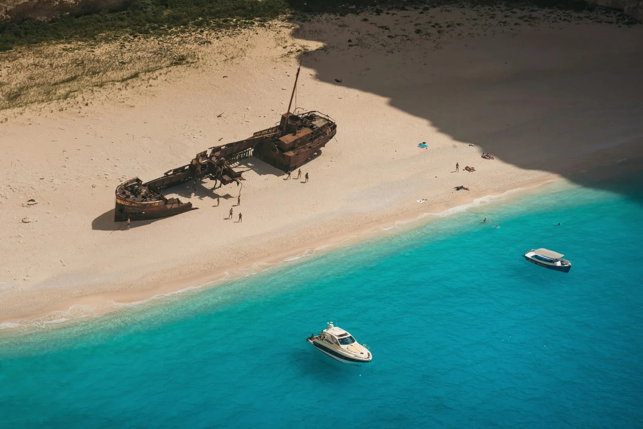 Aerial Photography of Shipwreck on the Sandy Shore of a Beach in Zakynthos, Greece