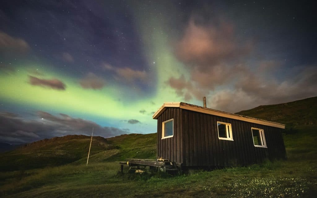 Brown Wooden House Under the Starry Sky
