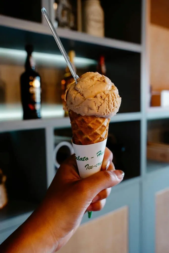 Person Holding Ice Cream in a Cone in Porto, Porto District, Portugal