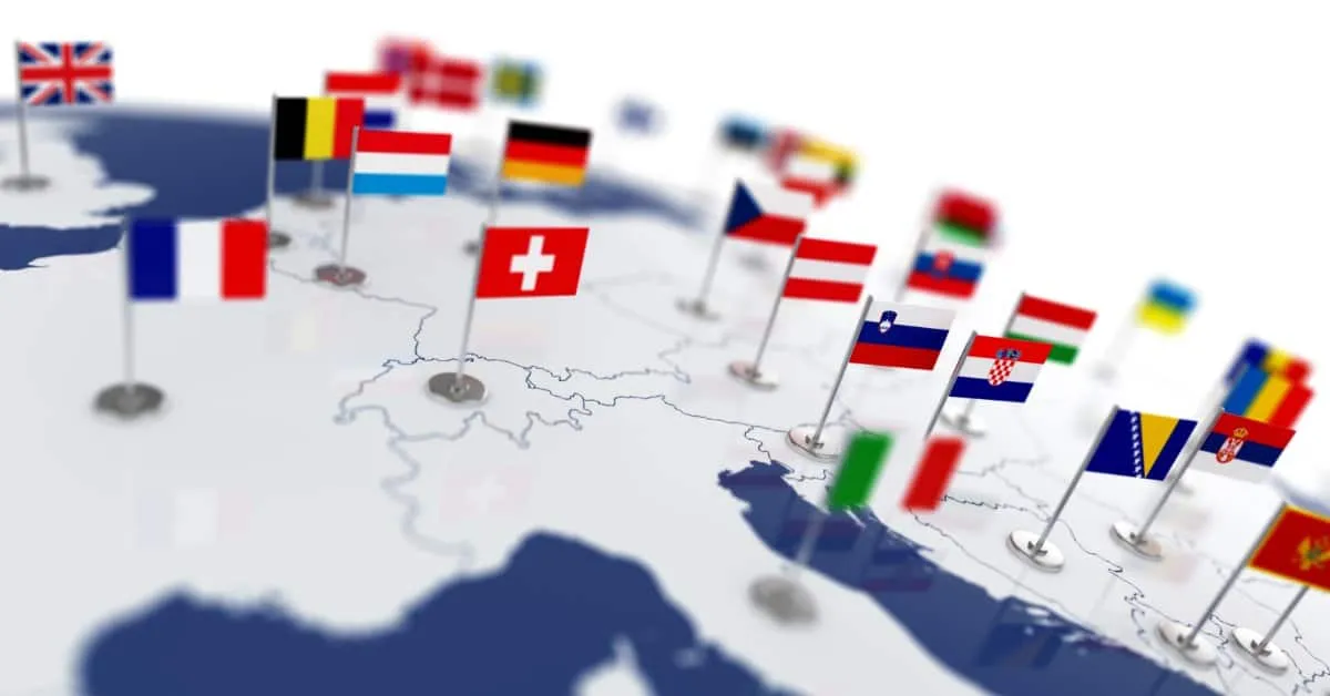 A drawn map with a close-up view of various European countries. There are mini flags in each country's location.