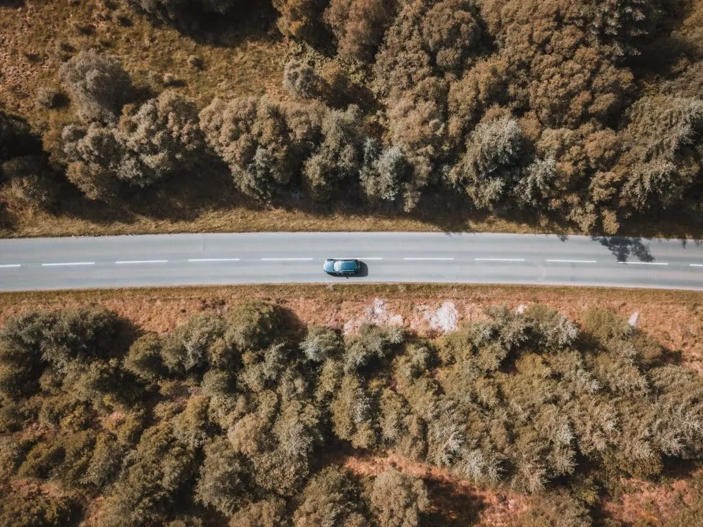 Car traveling on road in Sunny Scotland