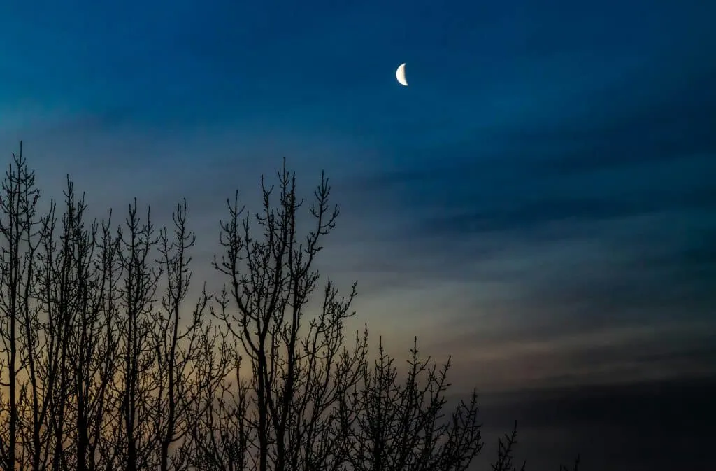 Moon above Reykjavik in Iceland on a calm night