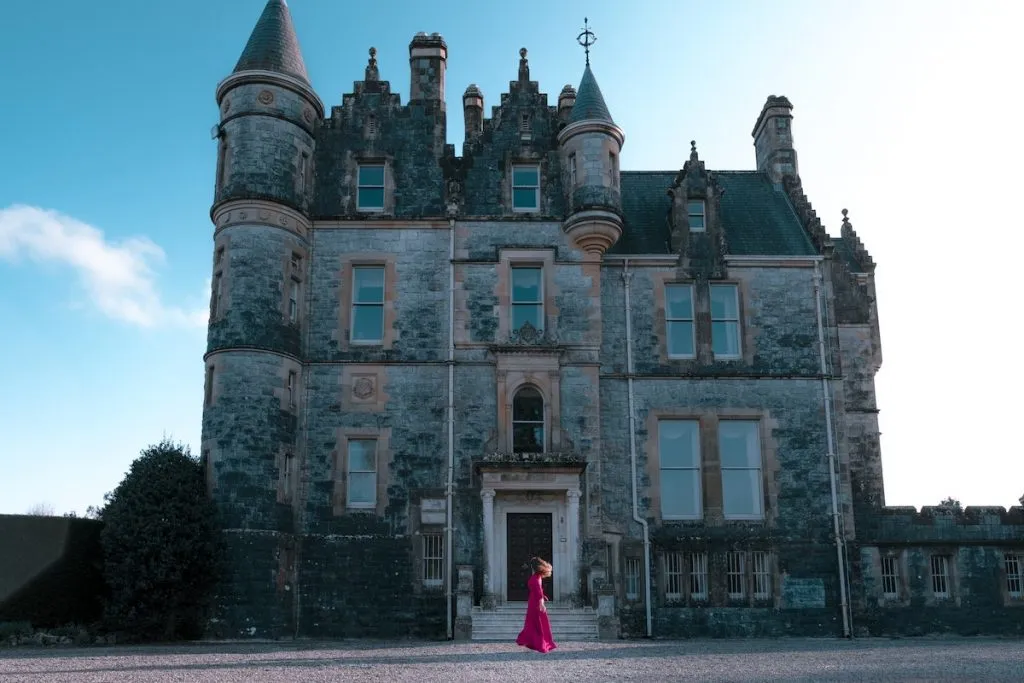 Woman in a red dress in Blarney Castle, Cork, Ireland