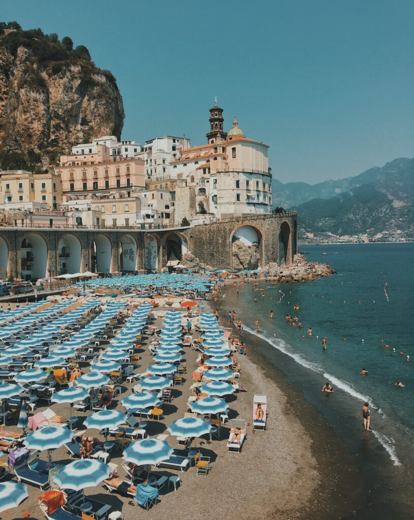 italian coastline with umbrellas