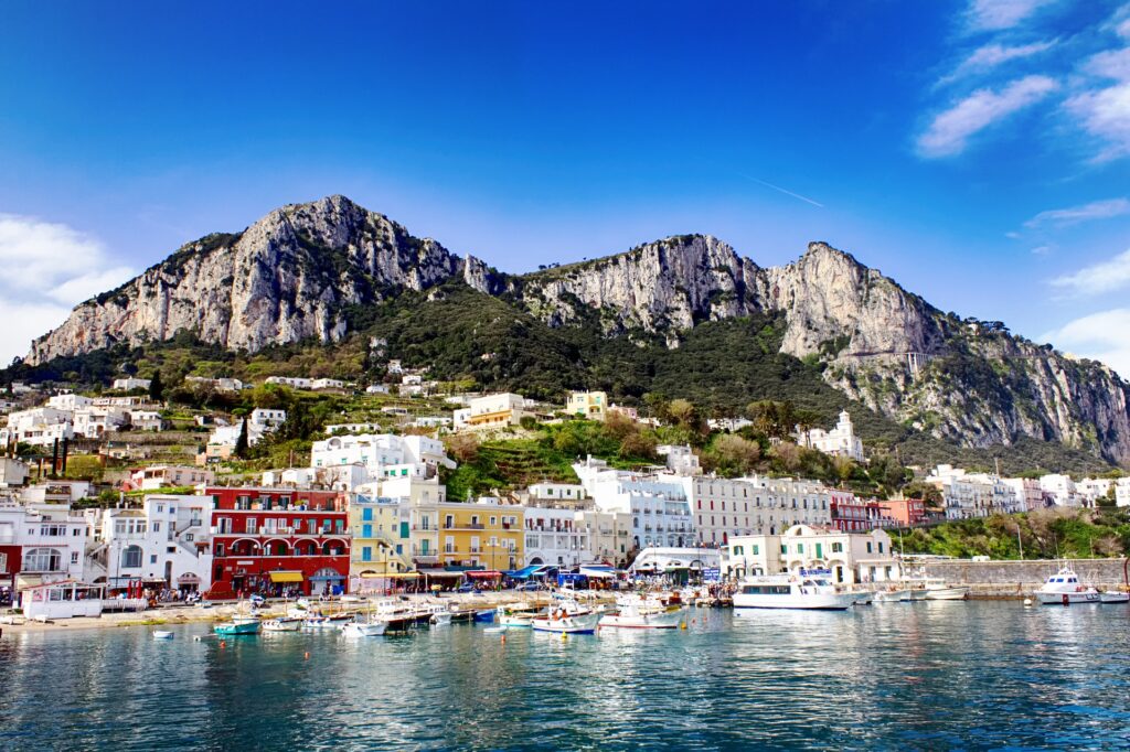 water view of Capri Italy town with mountains