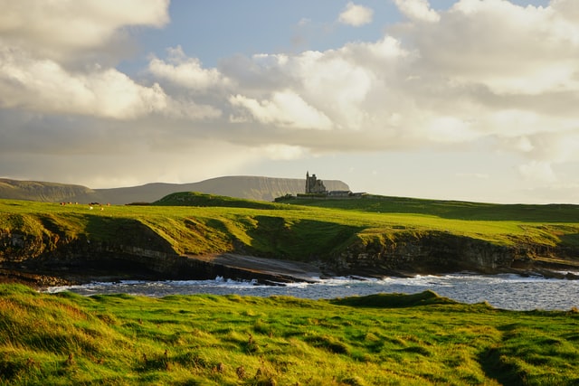 green fields and castle in Donegal, Irelanddo