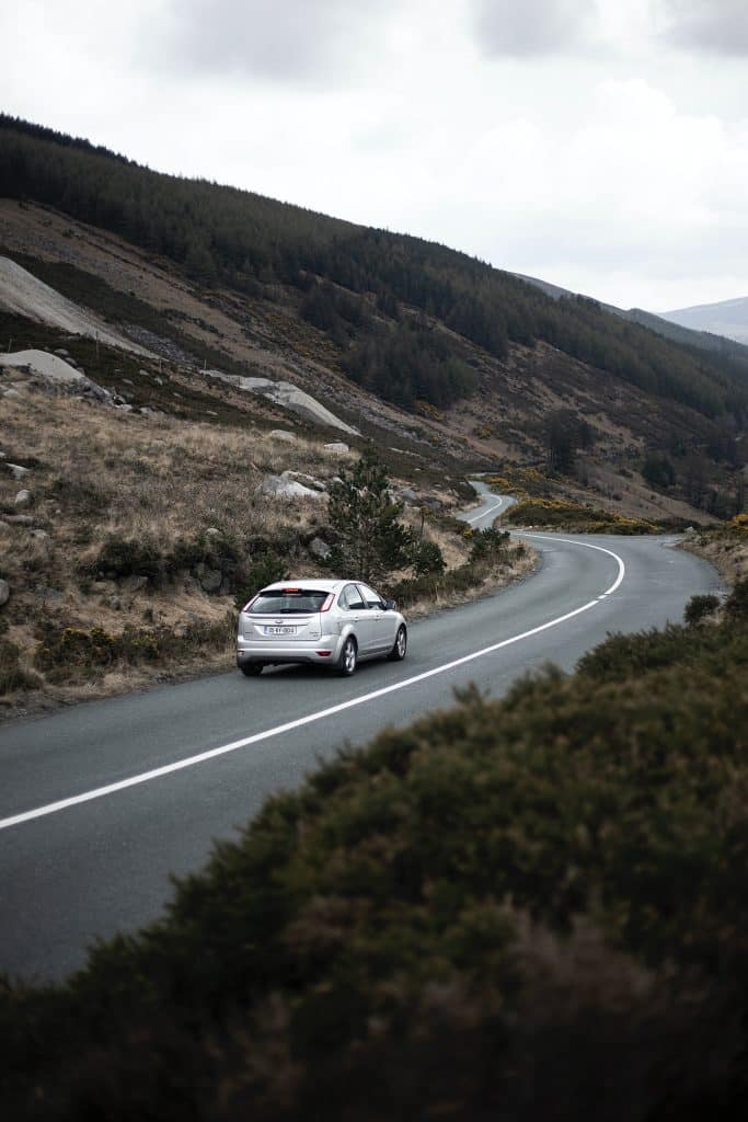 Car on road in Ireland Highlands