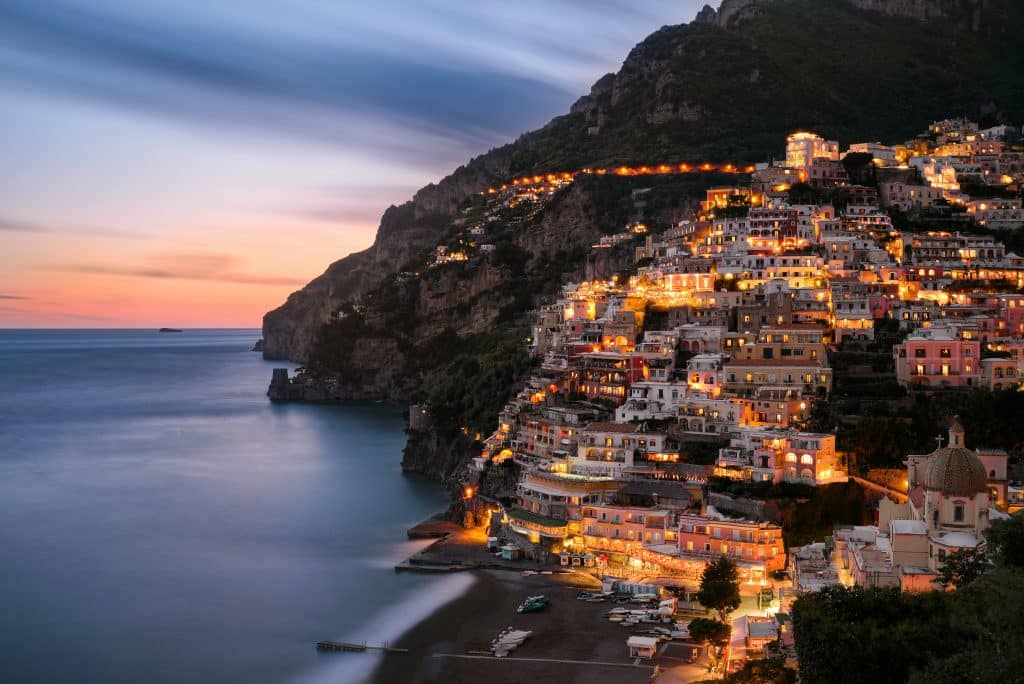 Amalfi Beaches - Coastal Amalfi town lit up during night time