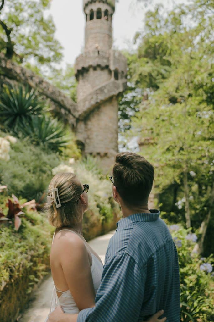 Couple embracing in front of forest background in Portugal