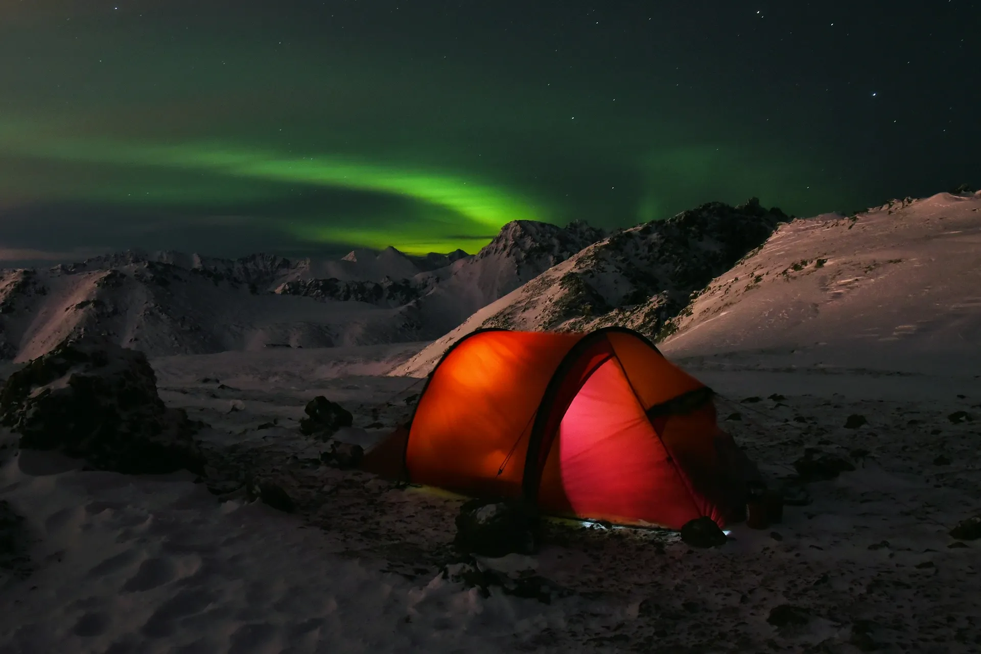 Evening Northern Lights over an Alaska lodge