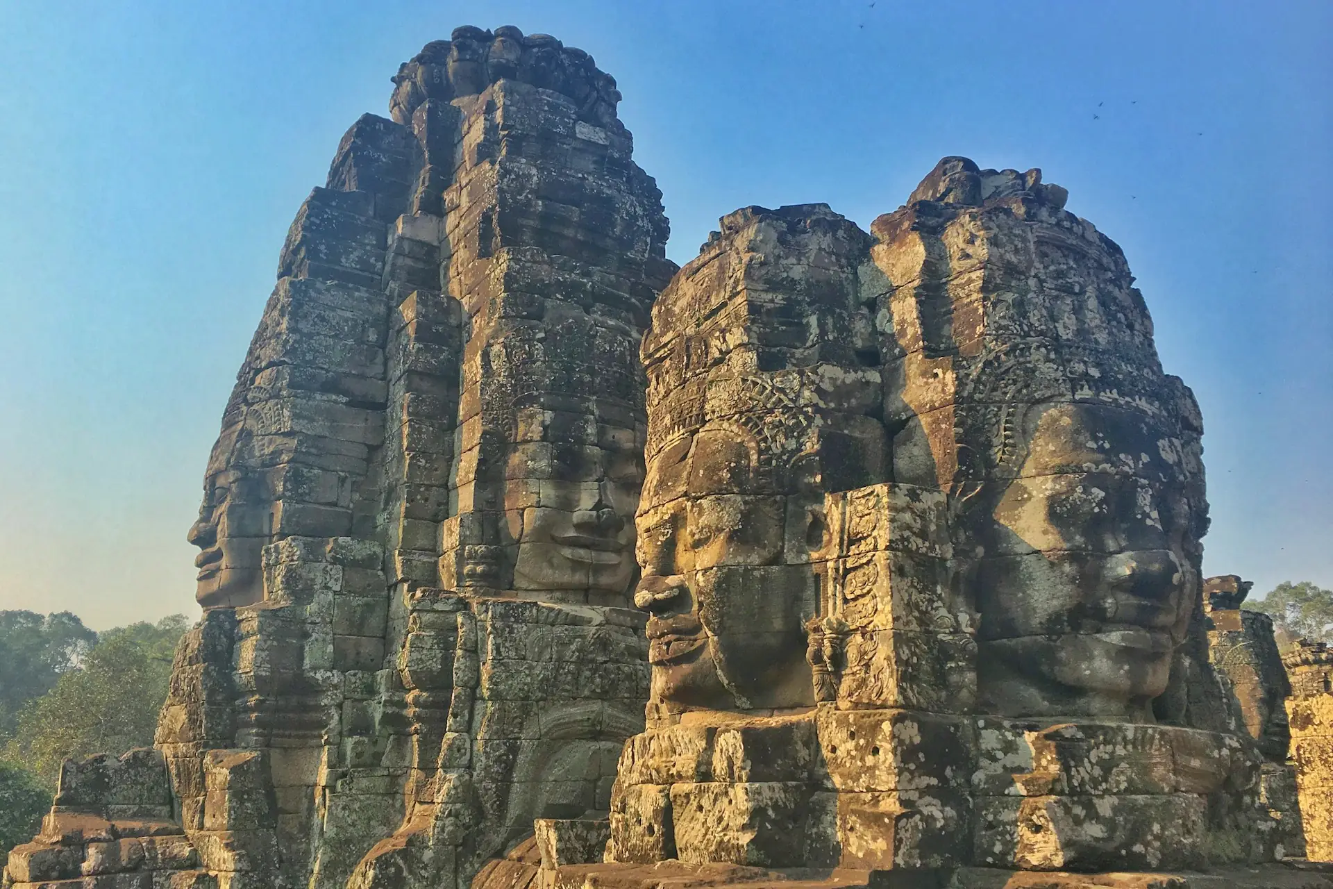 Afternoon among the faces of the Bayon and Ta Prohm