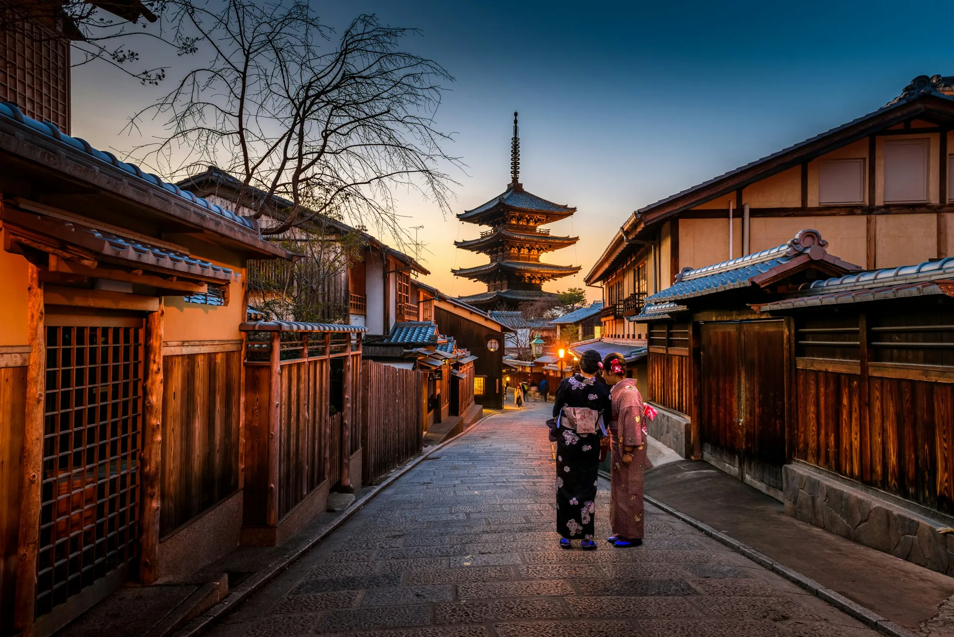 A couple on a Japan honeymoon by the sea