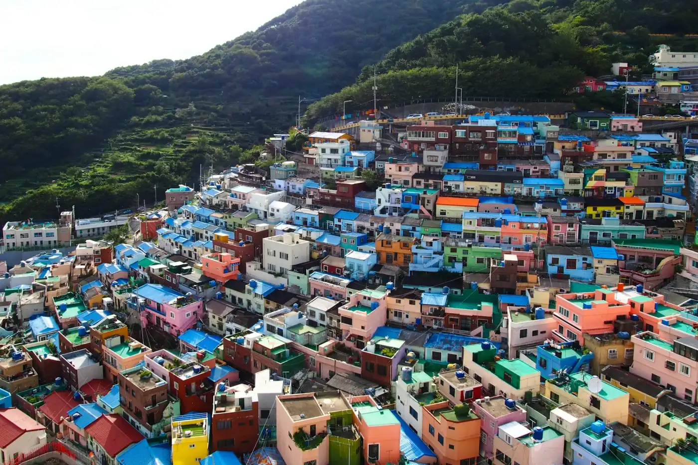 Busan coastline with Gamcheon Culture Village houses stacked above the sea