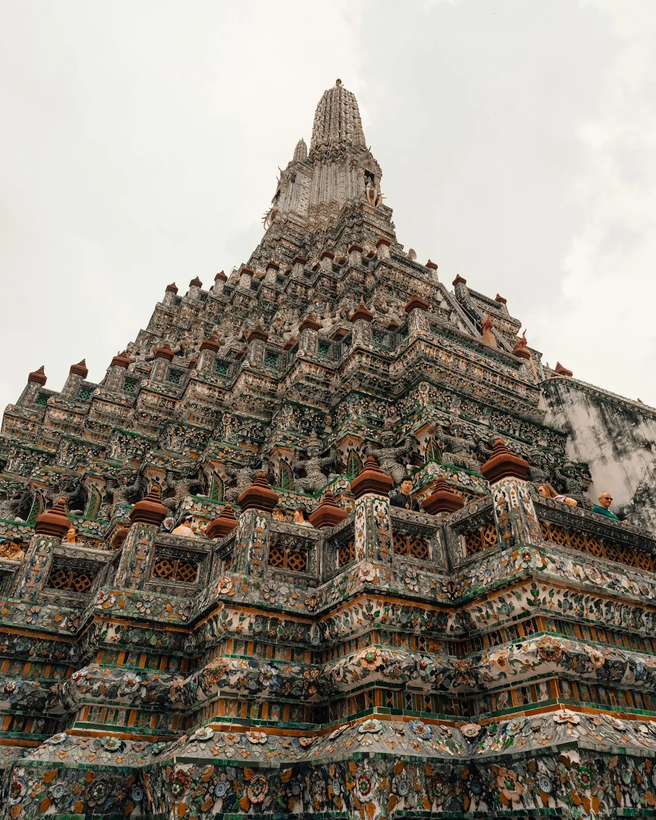Thai temple and longtail boats — custom Thailand tours by Juniper Tours
